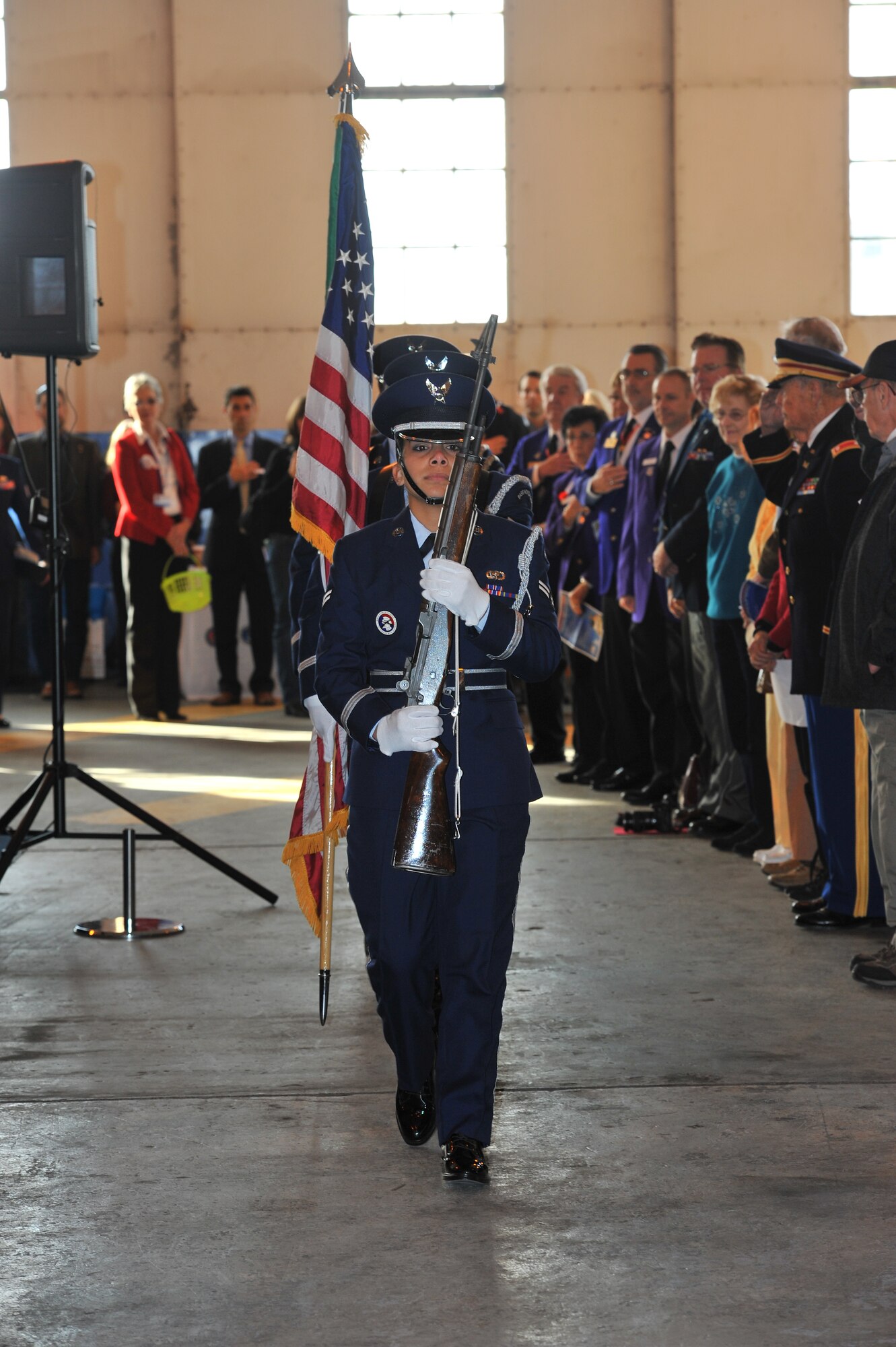 Members of the Fairchild Air Force Base honor guard perform colors at the Veterans Day ceremony Nov. 11, 2013, at Felts Field in Spokane, Wash. During the ceremony, men and women received recognition for their service and sacrifice. (U.S. Air Force photo by Staff Sgt. Veronica Montes/Released)