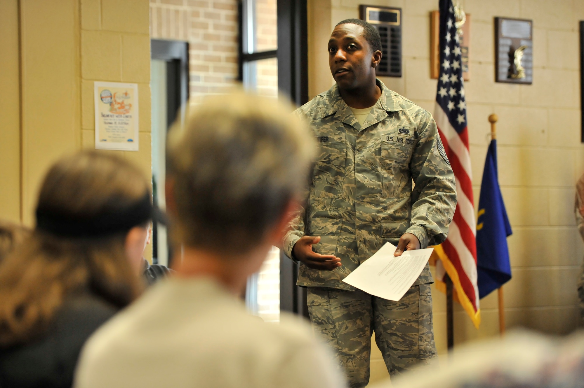 U.S. Air Force Tech. Sgt. Gregory Fifer, 20th Logistics Readiness Squadron non-commissioned officer in charge of the fuels laboratory, starts his lesson with a group of high school home school students at Shaw Air Force Base, S.C. Nov. 7, 2013. The students, who were from the local Sumter, S.C. area, got a real-world lesson on math and chemistry in the fuels laboratory. (U.S. Air Force photo by Airman 1st Class Jonathan Bass/Released)