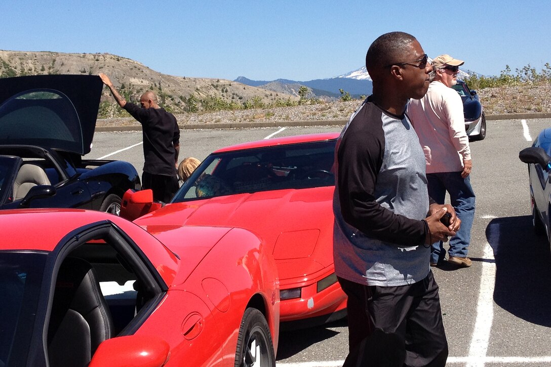 Chief Master Sgt. Arthur Green Jr., 36th Aerial Port Squadron chief of operations, by his "toy" Corvette. Green is an automobile enthusiast and avid motorcylce rider when during his "off-duty" time. He shows his appreciation for the veterans who served before him by giving them rides and supporting veteran-sponsored car shows and events. (Courtesy photo by Chief Master Sgt. Arthur Green)