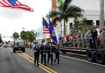 The 482nd Fighter Wing Honor Guard from Homestead Air Reserve Base, Fla.,  passes in review during the 2013 Homestead Veterans Day Parade on Nov. 11.  Sponsored by the Homestead Veterans of Foreign Wars Post 4127, the parade is the oldest and largest Veterans Day celebration in Miami-Dade County. (U.S. Air Force picture/Tim Norton)