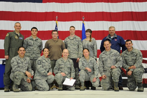 Airmen are recognized during the Quarterly Awards Ceremony at Fairchild Air Force Base, Wash., Nov. 8, 2013. The awards are given to Airmen who display above and beyond behavior on and off duty. (U.S. Air Force photo by Airman 1st Class Janelle Patiño/Released)