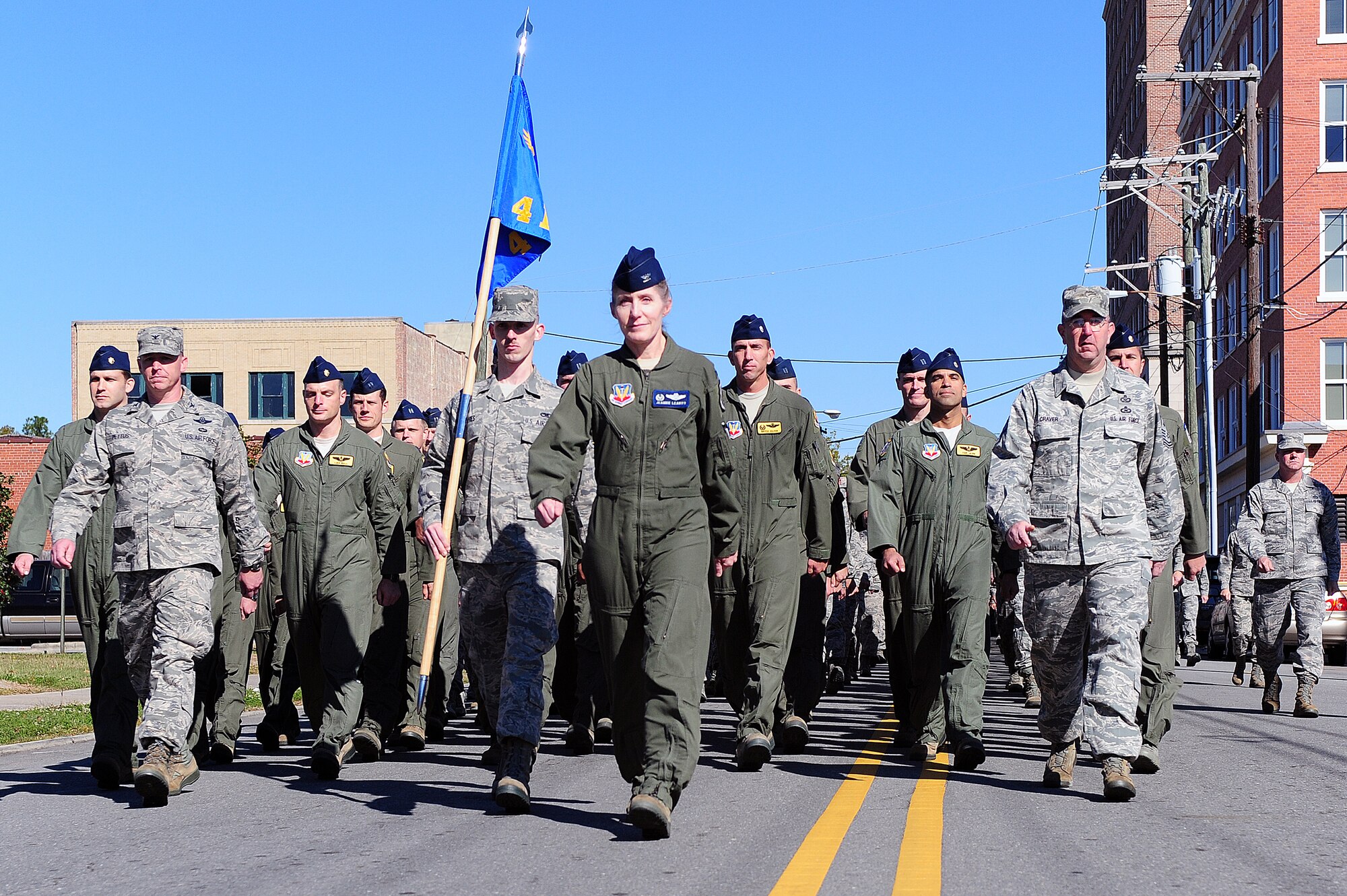 More than 500 U.S. Air Force Airmen assigned to Seymour Johnson Air Force Base march in a parade in Goldsboro, N.C., Nov. 11, 2013. Airmen, veterans and police organizations all marched to honor veterans. (U.S. Air Force photo by Airman 1st Class John Nieves Camacho)