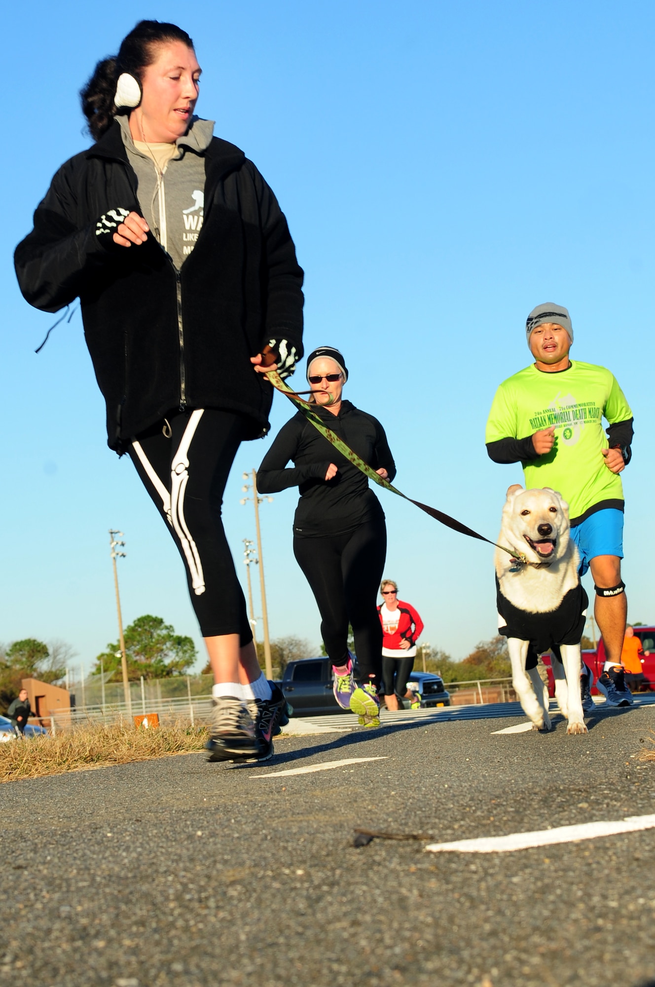 Runners approach the finish line during the Combined Federal Campaign 5K at Langley Air Force Base, Va., Nov. 8, 2013. According to its website, the CFC is the world’s largest and most successful workplace charity campaign, raising millions of dollars between Sept. 1 and Dec. 15 each year. (U.S. Air Force photo by Airman Areca T. Wilson/Released)