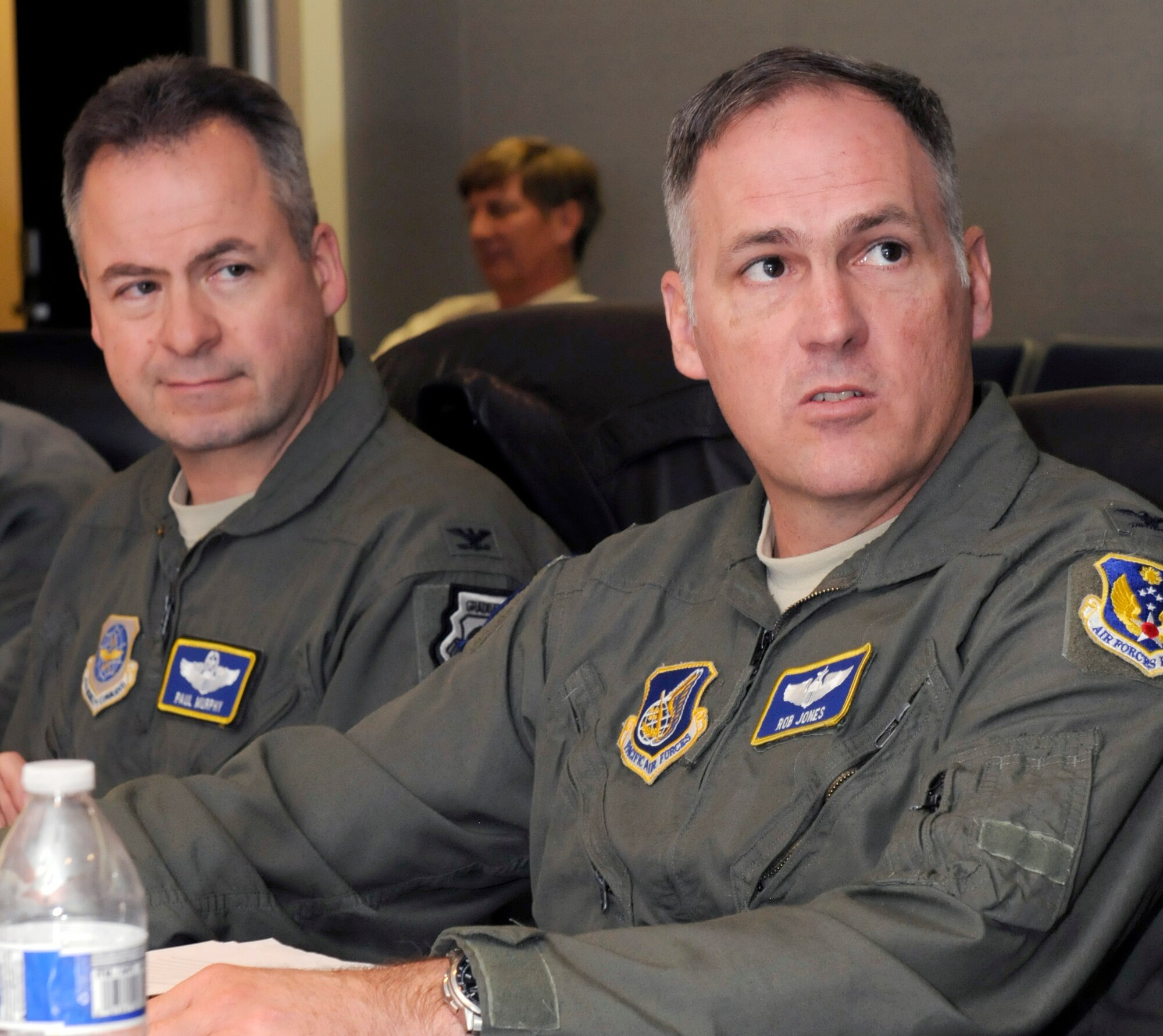 Col. Paul Murphy, Air Mobility Command chief of safety, and Col. Robert Jones, Pacific Air Forces chief of safety, listen to the discussions during the Senior Safety Advisory Council meeting held Nov. 5 - 6 at the Air Force Safety Center, Kirtland Air Force Base, N.M. Discussion topics covered aviation, ground, the Air Force Safety Automated System (AFSAS), policies, manpower, human factors, training, safety investigation boards and the safeguard of privileged information. (U.S. Air Force photo by Airman 1st Class Aaron Brown)