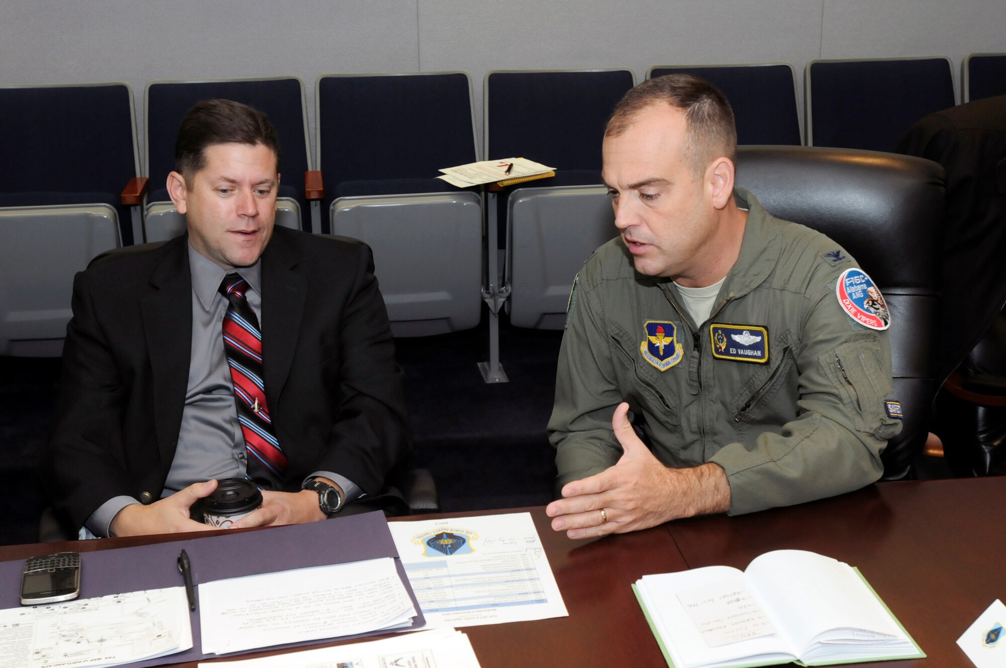 Col. Edward Vaughan IV, Air National Guard chief of safety, discusses safety programs with Daniel Polanosky, Air National Guard associate director of safety, during the Senior Safety Advisory Council meeting held Nov. 5 - 6 at the Air Force Safety Center, Kirtland Air Force Base, N.M. Discussion topics covered aviation, ground, the Air Force Safety Automated System (AFSAS), policies, manpower, human factors, training, safety investigation boards and the safeguard of privileged information. (U.S. Air Force photo by Airman 1st Class Aaron Brown)