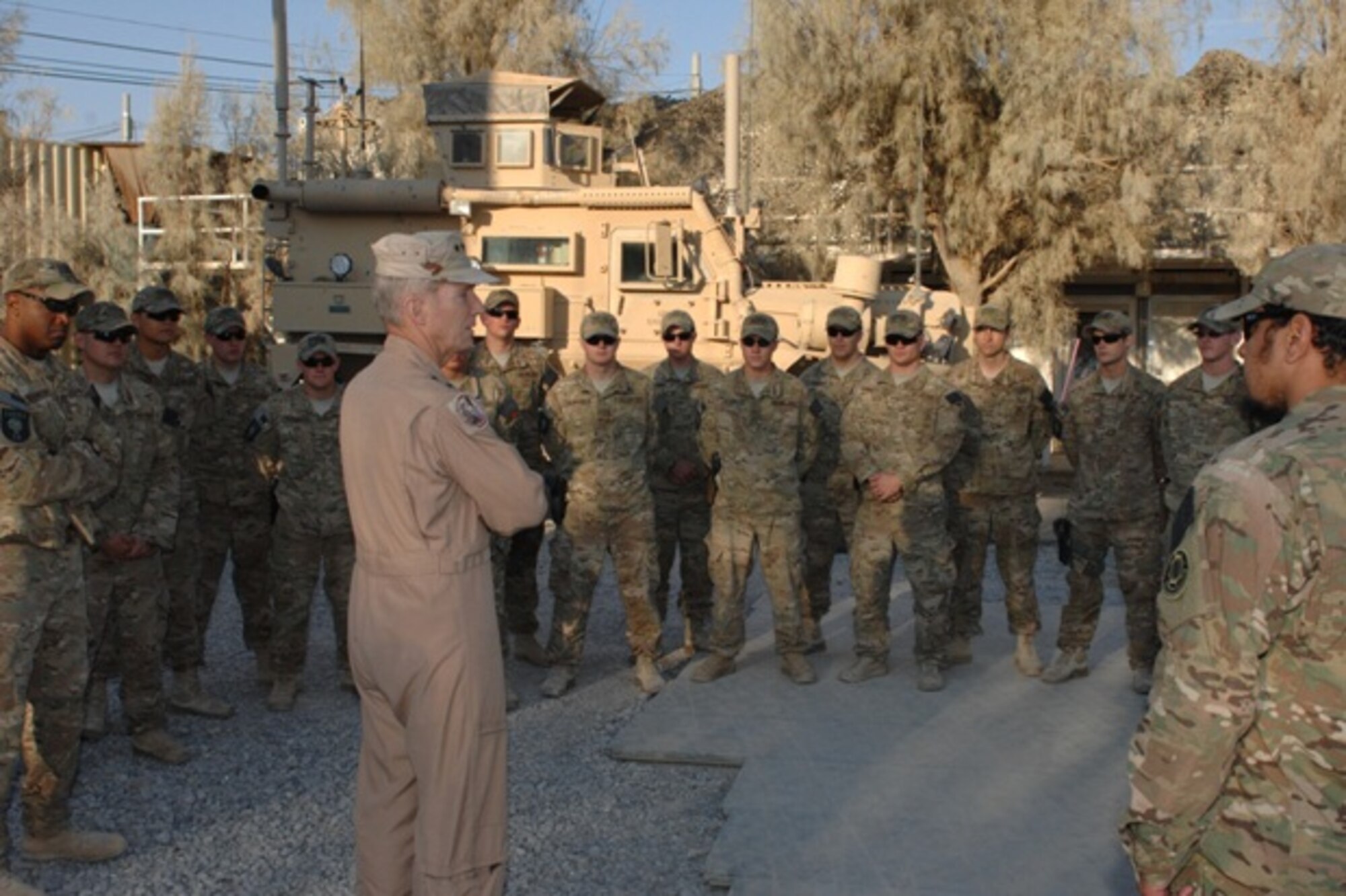 Gen. Mike Hostage, Air Combat Command commander, speaks with security forces Airmen at Kandahar Airfield, Afghanistan, Nov. 8 2013. Hostage is touring various deployed locations in Southwest Asia to meet with Airmen and leadership. Hostage answered questions from the Airmen about future expectations with limited fiscal resources. (U.S. Air Force photo by Senior Airman Jack Sanders)