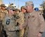 Gen. Mike Hostage, Air Combat Command commander, greets security forces Airmen at Kandahar Airfield, Afghanistan, Nov. 8 2013. Hostage toured various deployed locations in Southwest Asia to meet with Airmen and leadership. (U.S. Air Force photo by Senior Airman Jack Sanders)