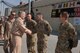 Gen. Mike Hostage, Air Combat Command commander, shakes hands with Kandahar Airfield leadership after arriving here Nov. 8 2013. As a force provider for combat airpower in theater, Hostage talked to warfighting commanders, Airmen and members of the coalition team about their current operational issues and concerns. (U.S. Air Force photo by Senior Airman Jack Sanders)