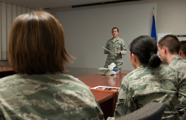 Airman 1st Class Kim Perez, 790th Missile Security Forces Squadron, speaks with Airmen at the First Term Airman Center on F.E. Warren Air Force Base, Wyo., Nov. 5, 2013. Perez shadowed Chief Master Sgt. Michael Garrou, 90th Missile Wing command chief, that day, and Garrou was scheduled to speak with the FTAC class. Perez was the first Airman selected to be the Chief’s Shadow. (U.S. Air Force photo by Airman 1st Class Jason Wiese)
