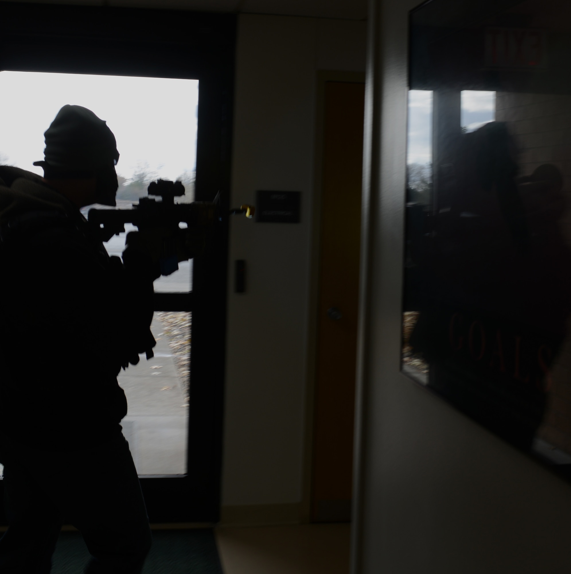 Staff Sgt. Mike Hejmanowski, 366th Security Forces Squadron evaluator, stalks for a target of opportunity inside the base hospital Nov. 6, 2013, during an active-shooter training exercise at Mountain Home Air Force Base, Idaho. “The safety of our patients and staff is extremely important to 366th Medical Group leadership and they felt the time spent on such training would enhance the level of safety,” said Lt. Col. Robert Corby, 366th Medical Support Squadron commander. “We want to be able to expose opportunities for improvement in an exercise environment so we are fully prepared to respond in the event of a real-life situation. The training exposed hospital personnel to a realistic active-shooter situation that mirrored the environment and associated confusion brought on by a heightened state of anxiety.” (U.S. Air Force photo by Senior Airman Benjamin Sutton/RELEASED