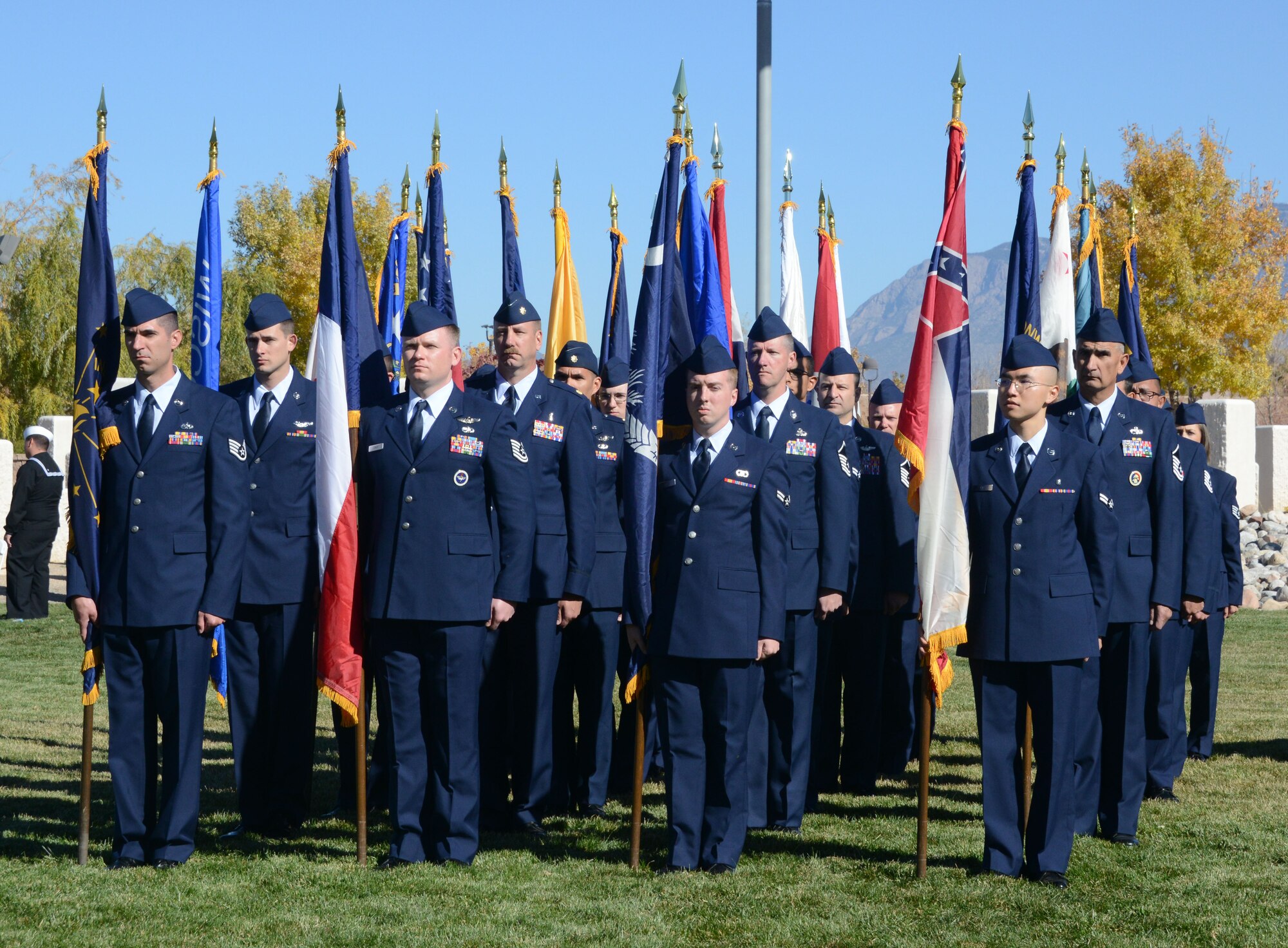 Airmen from various units across the base stand in formation at the Veterans Day ceremony at Memorial Park Nov. 11.  (Photo by Dennis Carlson)