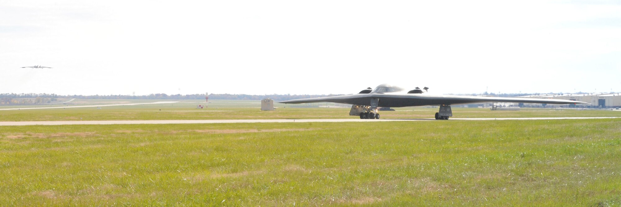 B-2 Spirits take off at Whiteman Air Force Base, Mo., Nov. 3, 2013. The B-2 Spirit is a multi-role bomber capable of delivering both conventional and nuclear munitions. (U.S. Air Force photo by Airman 1st Class Keenan Berry/Released)