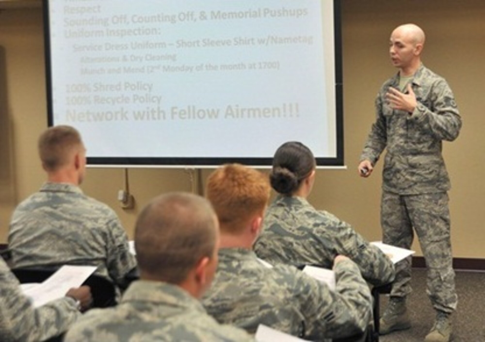 Staff Sgt. Todd Wickham, Hurlburt Field Commando Pride Airman Center NCO in charge, instructs a CPAC class at Hurlburt Field, Fla., Nov. 1, 2013. During the weeklong course, Wickham introduced more than 30 new Air Commandos to the Air Force, Air Force Special Operations Command, and Hurlburt Field culture. (U.S Air Force photo/Airman 1st Class Andrea Posey)