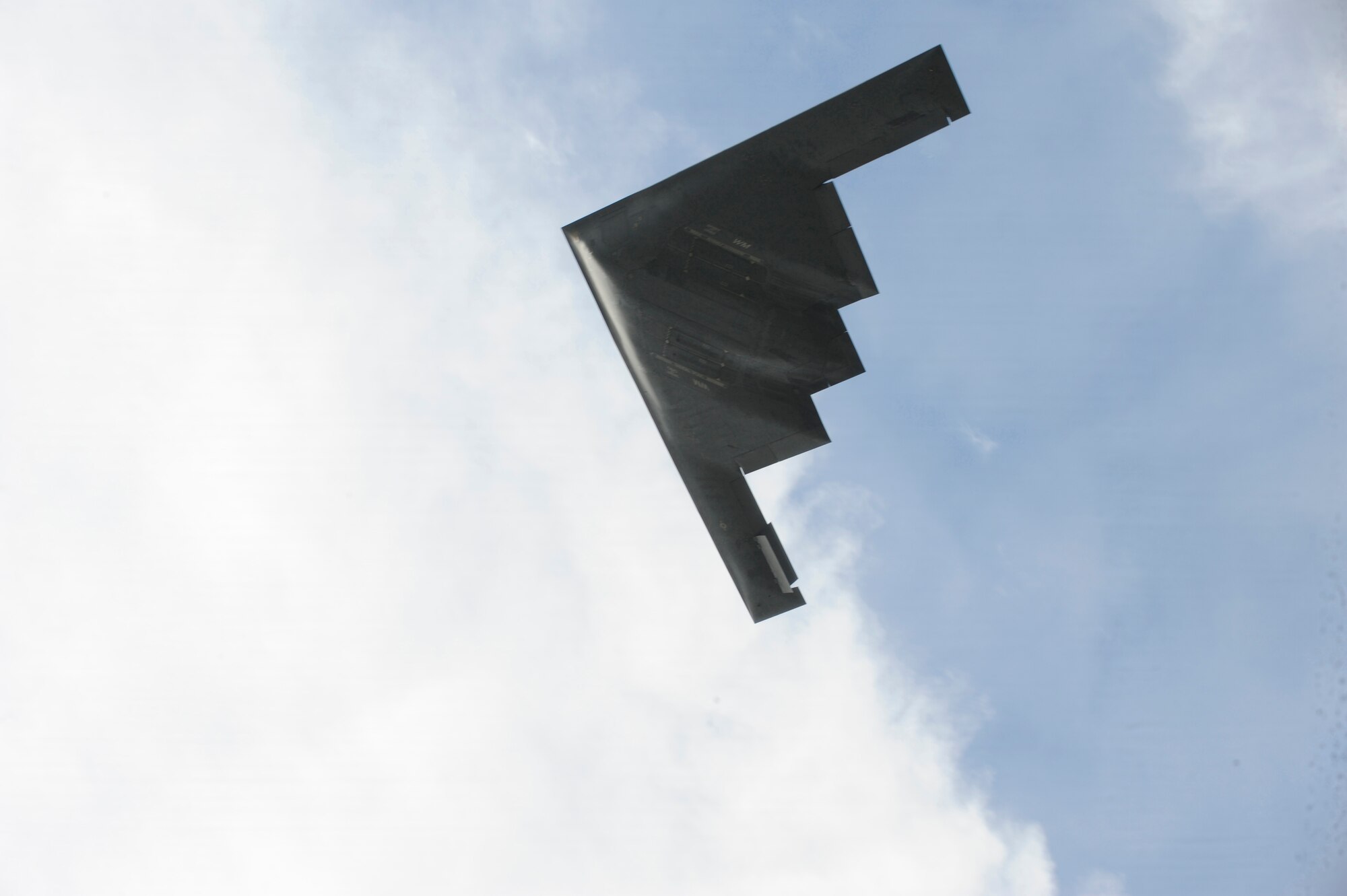 A B-2 Spirit stealth bomber flies over Whiteman Air Force Base, Mo., during training Nov. 3, 2013. The B-2 runs off four engines, each of which provides 17,300 pounds of thrust. (U.S. Air Force photo by Staff Sgt. Alexandra Boutte/Released)
