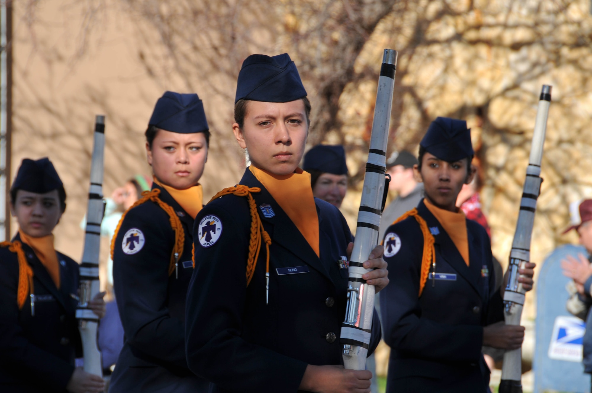 Members of the Bellevue West High School Junior Reserve Officer Training Corps pass the reviewing stand at the 14th annual Veterans Day Parade in Olde Towne Bellevue, Neb., Nov. 9. Other local schools participated in the parade along with the 55th Wing, U.S. Strategic Command and Air Force Weather Agency. (U.S. Air Force photo by 2nd Lt. Carly A. Costello/Released)