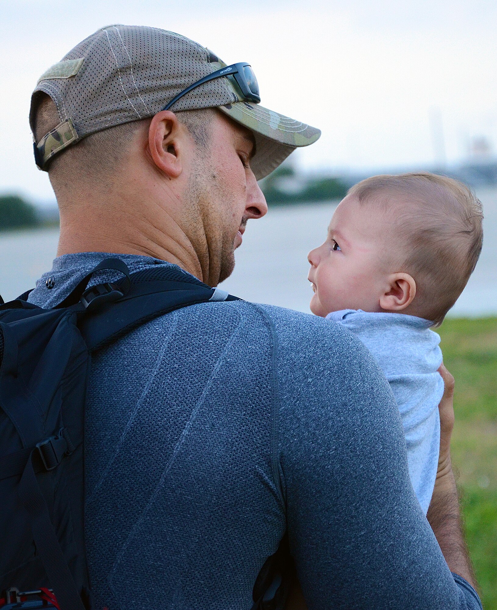 Reserve pararescueman Staff Sgt. Brandon Forshaw was one of approximately 20 920th Rescue Wing PJs and various support staff who deployed to the Horn of Africa in September to serve as part of Combined Joint Task Force - Horn of Africa. They were there to provide humanitarian aid and personnel recovery if needed. Here, Sergeant Forshaw gets reacquainted with his young son Cruz. (U.S. Air Force photo/Master Sgt. Paul Flipse)