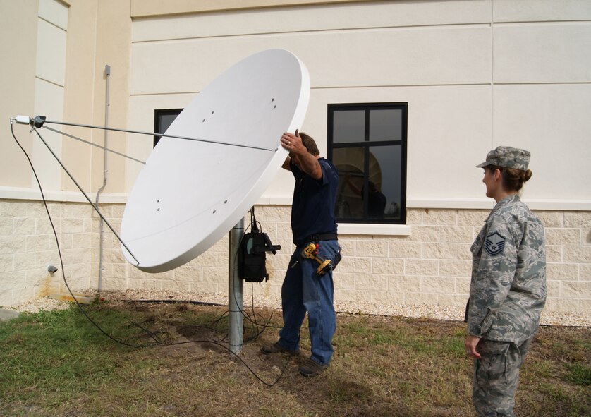 Master Sgt. Debra Allen, 927th Force Support Squadron, monitors the installation of Air Technology Network, a cost-effective, satellite-base medium used to train Airmen of the 927th Air Refueling Wing through a virtual classroom Nov. 7, 2013 at MacDill Air Force Base, Fla.