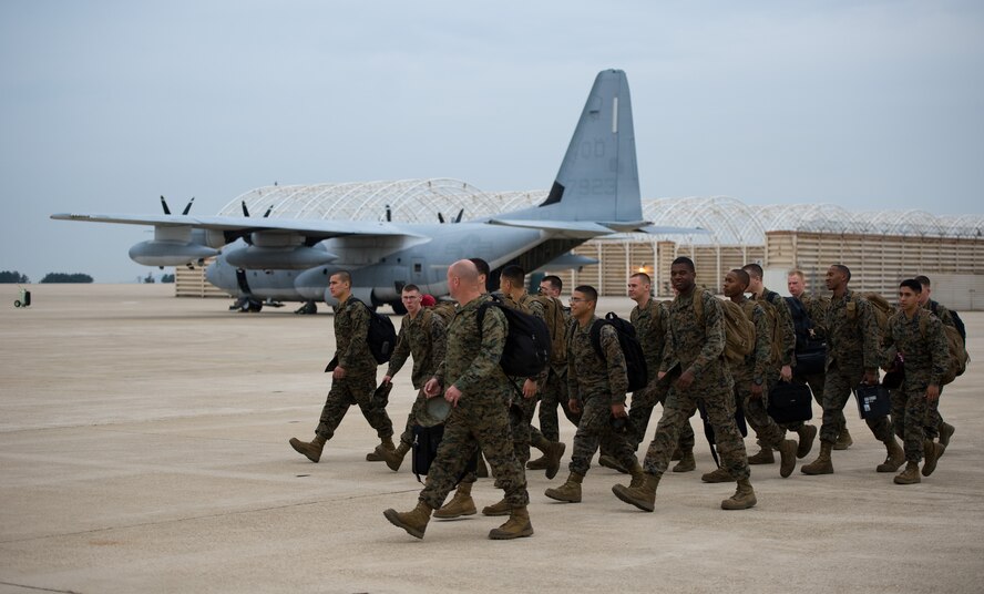 Marines depart Kunsan Air Base, Republic of Korea, Nov. 9, 2013, after participating in the two-week Max Thunder Exercise. The exercise showcased the team work of the Korean Air Power team, a mix of U.S. Air Force, U.S. Marine Corps and Republic of Korea Airmen working side by side. (U.S. Air Force photo by Senior Airman Armando A. Schwier-Morales/Released)