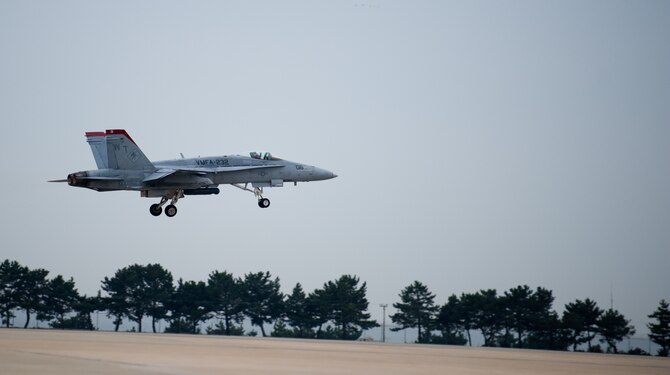 An F-18 Hornet from the U.S. Marine Corps Marine Fighter Attack Squadron 232 takes off at Kunsan Air Base, Republic of Korea, Nov. 9, 2013. Marines departed Kunsan after participating in the two-week Max Thunder Exercise. The exercise showcased the team work of the Korean Air Power team, a mix of U.S. Air Force, U.S. Marine Corps and Republic of Korea Airmen working side by side. (U.S. Air Force photo by Senior Airman Armando A. Schwier-Morales/Released)