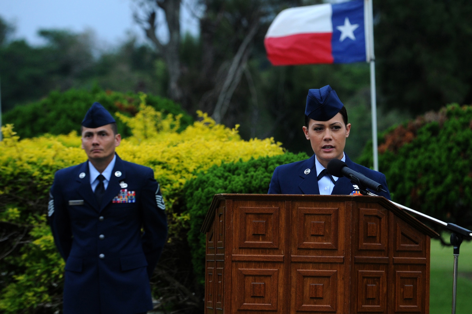 U.S. Air Force Tech. Sgt. Jewell Steamer, 33rd Rescue Squadron flight engineer, speaks to members of Team Kadena and retired military members during a Veterans Day ceremony at Kadena Air Base, Japan, Nov. 11, 2013. Steamer spoke about her experiences as a woman in the rescue squadron and the sacrifices her fellow service members made in the line of duty.  (U.S. Air Force photo by Staff Sgt. Amber E. N. Jacobs)