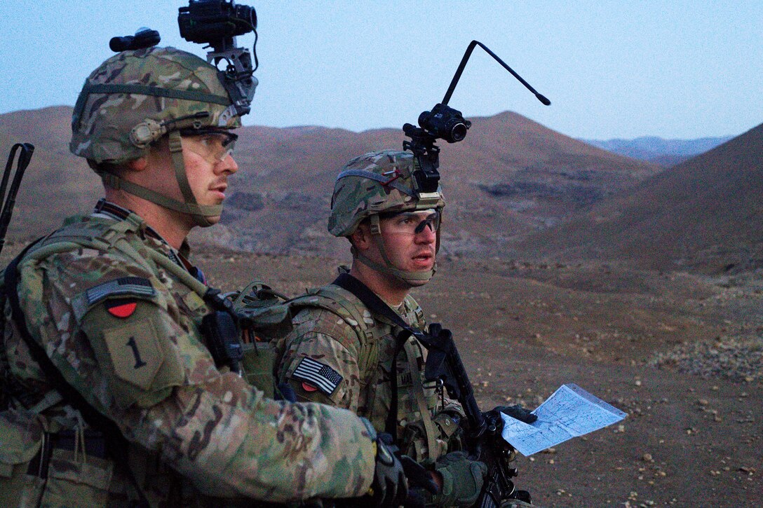 U.S. Army Capt. Richard Varner, left, and U.S. Army 2nd Lt. Gavin Master, discuss the best location to establish their mortar firing position near Combat Outpost Khilaguy, Afghanistan, Nov. 9, 2013. Varner and Master are assigned to the 1st Infantry Division's 6th Squadron, 4th Cavalry Regiment, 3rd Brigade Combat Team.