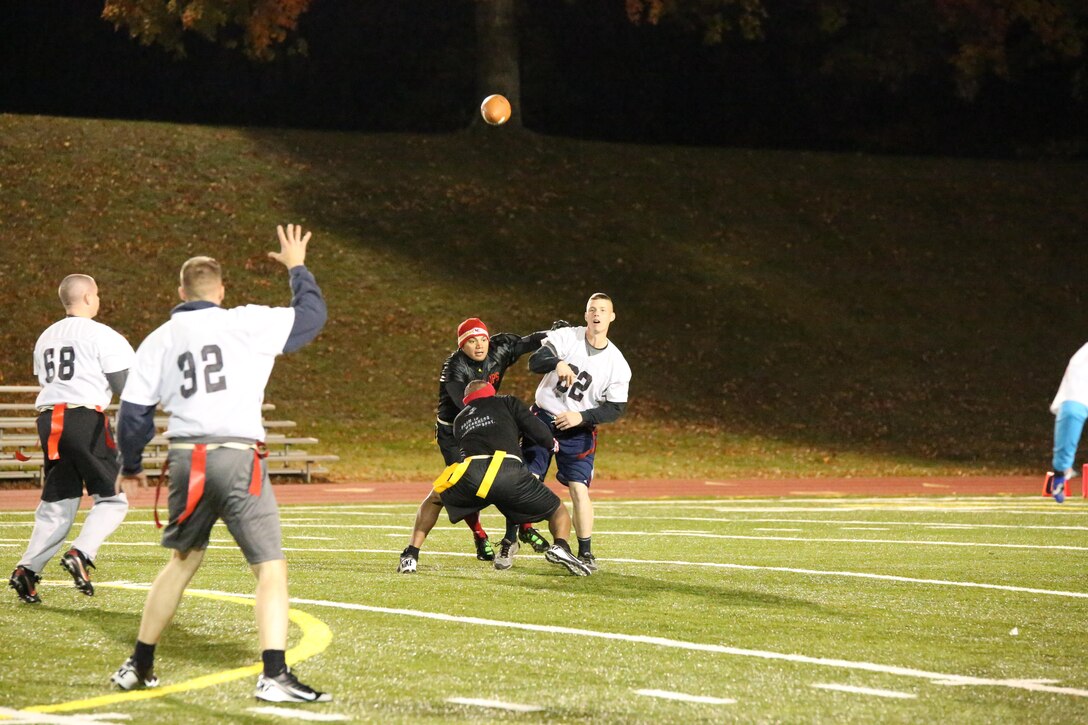 An H&S Finance player throws a pass during a game against M&RA Black Ops at Butler Stadium on Nov. 5, 2013. The Black Ops beat the Finance team 50-0. 