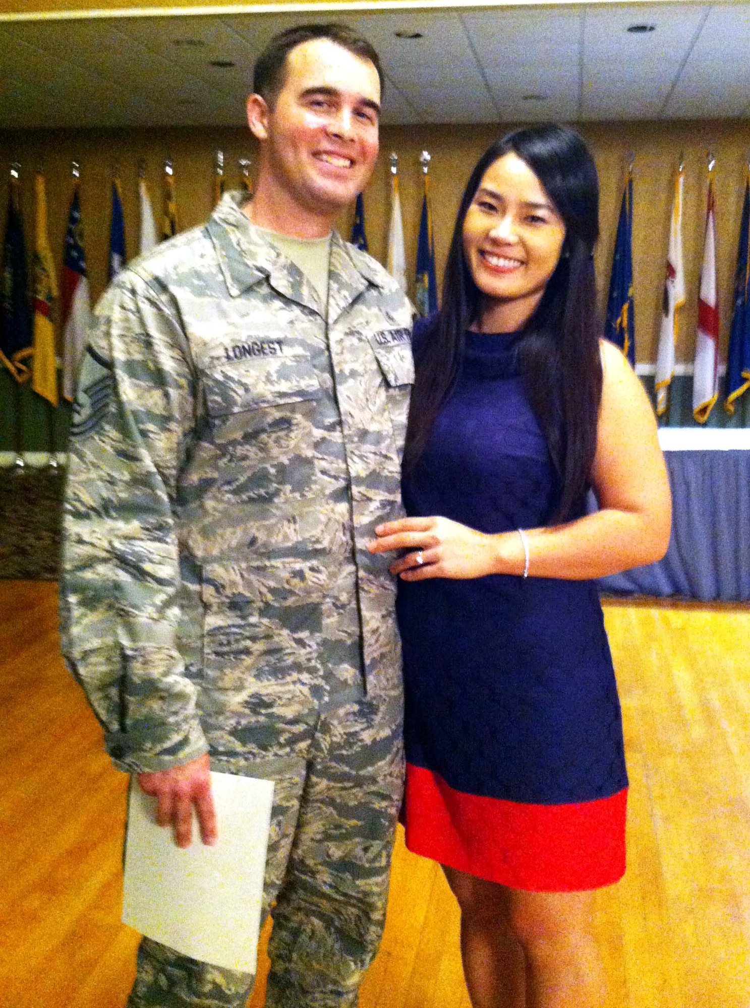 Master Sgt. Jacob Longest poses with his wife Seonkyoung Longest at an enlisted promotions ceremony April 30, 2013, Columbus Air Force Base, Miss. Jacob is the 14th Medical Operations Squadron interim superintendent. (Courtesy Photo) 
