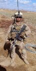 Lance Cpl. John Patterson, a native of Columbia, Md., took this photo during his deployment to Helmand Province, Afghanistan in 2011. Patterson’s left leg was severed below the knee when a bomb went off as he entered a building during a combat patrol Jan. 23, 2011. He now works as an intern at Program Executive Officer Land Systems through the Wounded Warrior Intern Program, part of the Naval Acquisition Development Program. 