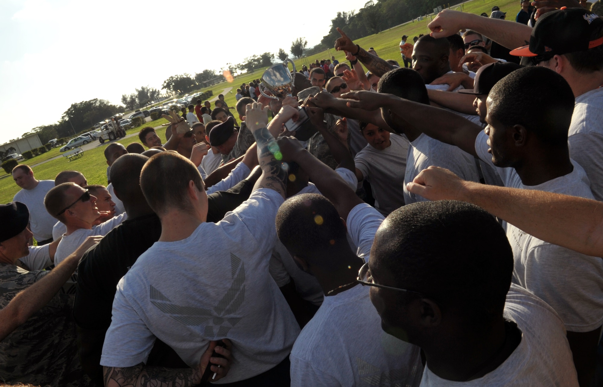 The 18th Security Forces Squadron team became the champions of the Commander’s Cup during the 18th Mission Support Group Sports Day at Marek Park on Kadena Air Base, Japan, Nov. 8, 2013. The event gave the competing squadrons mentorship and professional development opportunities while establishing camaraderie amongst the group’s Airmen. (U.S. Air Force photo by Naoto Anazawa)