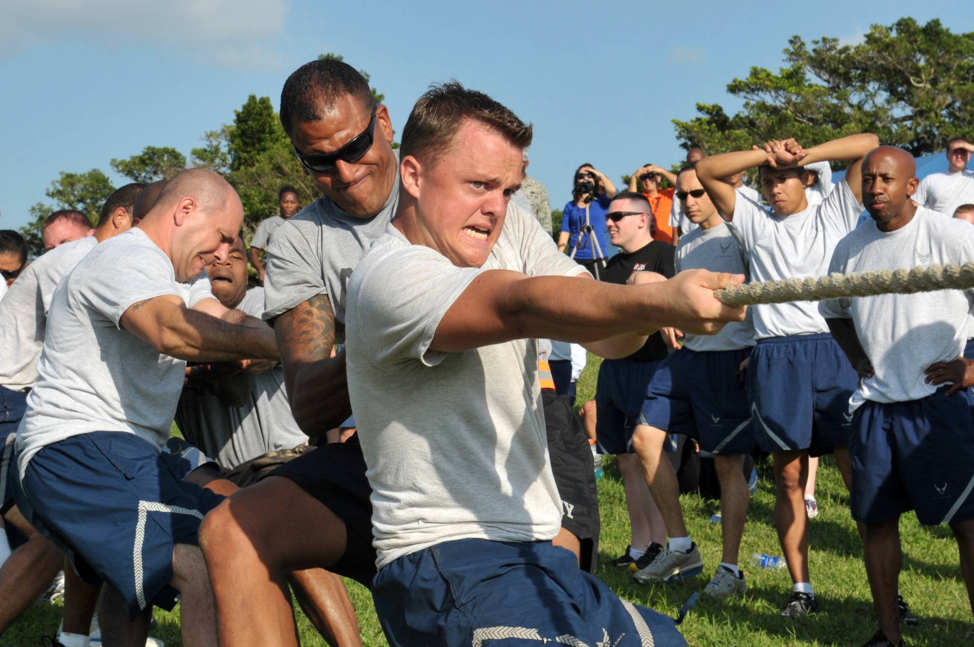 U.S. Air Force Airmen from 18th Mission Support Group participate in a tug-of-war competition during the 18th MSG Sports Day at Marek Park on Kadena Air Base, Japan, Nov. 8, 2013. Teams were divided into the 18th Communication Squadron, 18th Contracting Squadron, 18th Force Support Squadron, 18th Logistics Readiness Squadron and 18th Security Forces Squadron. (U.S. Air Force photo by Naoto Anazawa)