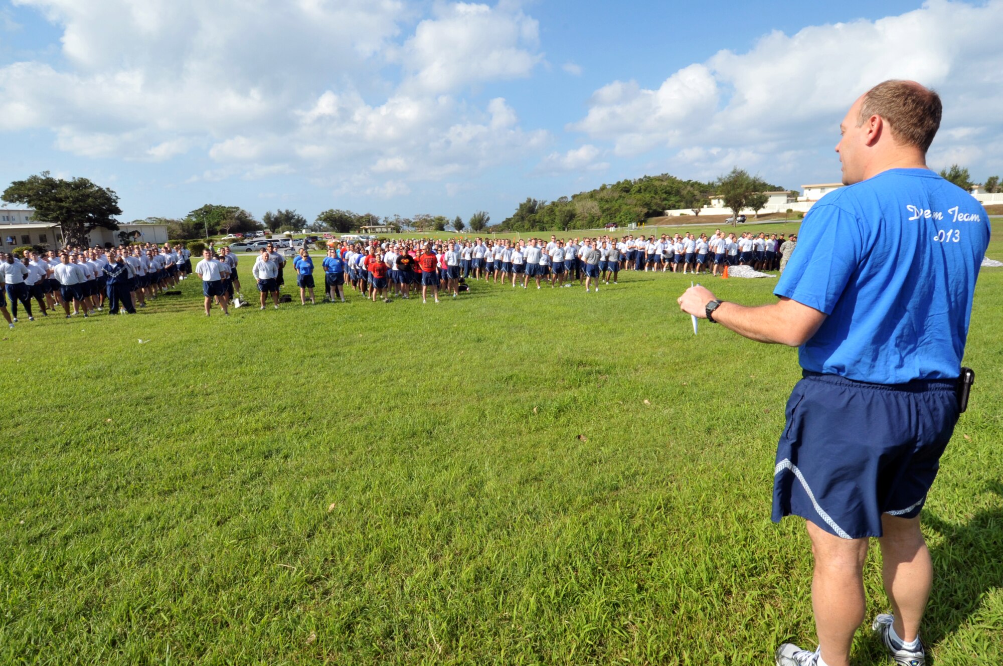 U.S. Air Force Col. Jeffrey Ullmann, 18th Mission Support Group commander, gives an opening speech during the 18th MSG Sports Day at Marek Park on Kadena Air Base, Japan, Nov. 8, 2013. Approximately 800 members from 18th MSG participated in the event. (U.S. Air Force photo by Naoto Anazawa)