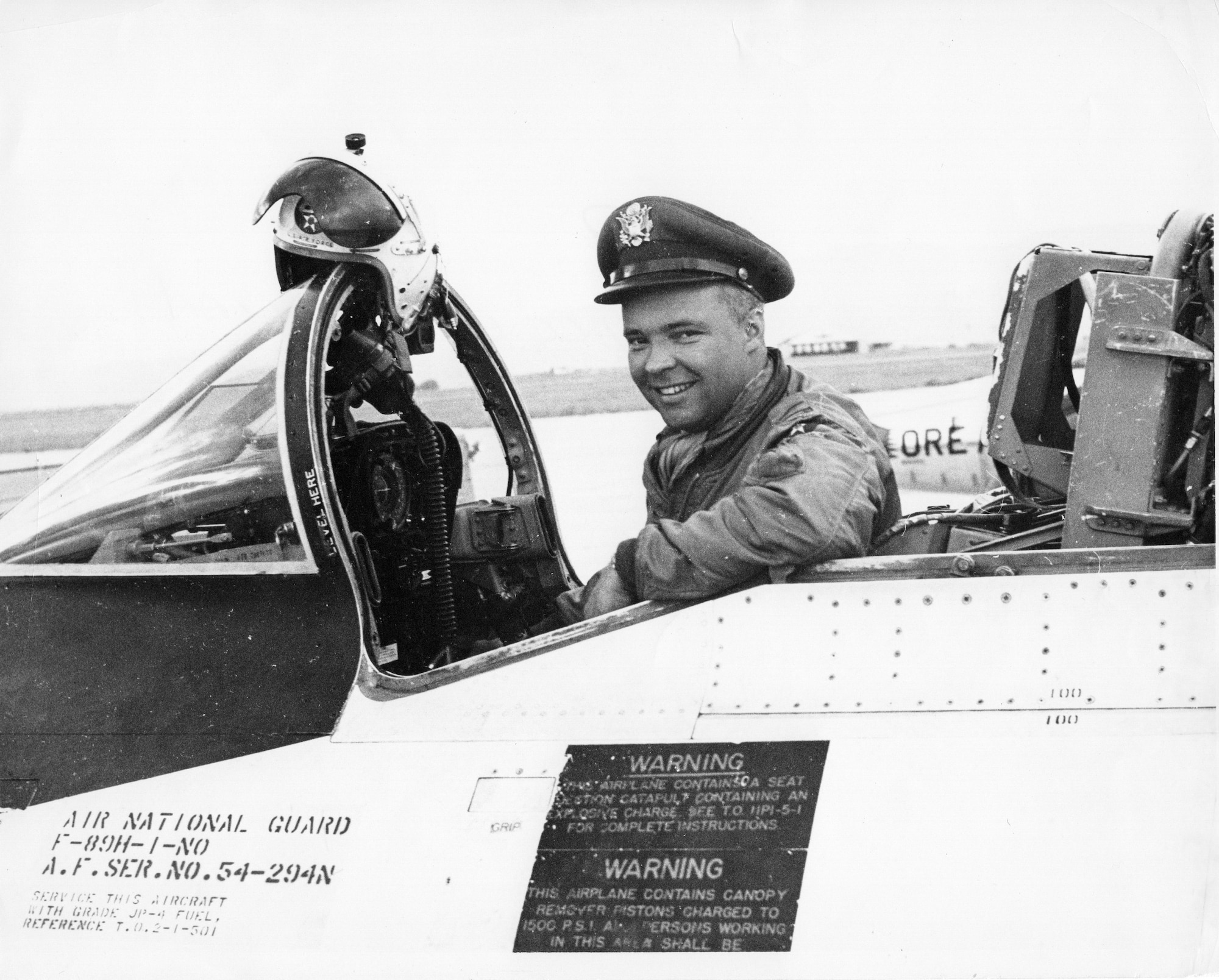 Walter W. “Wally” Fellman, Jr., smiles as he sits in the cockpit of an OreANG Northrop F-89H Scorpion fighter-interceptor in the late 1950s.  Fellman flew the North American F-86 Sabre fighter in combat during the Korean War.