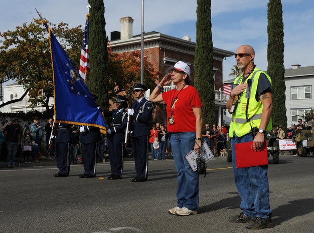Beale’s Honor Guard presents the colors during the National Anthem at the Yuba/Sutter Veterans Day Parade in Marysville, Calif., Nov. 11, 2013. Col. Phil Stewart, 9th Reconnaissance Wing commander, served as the grand marshal of the event. (U.S. Air Force photo by Staff Sgt. Robert M. Trujillo/Released)