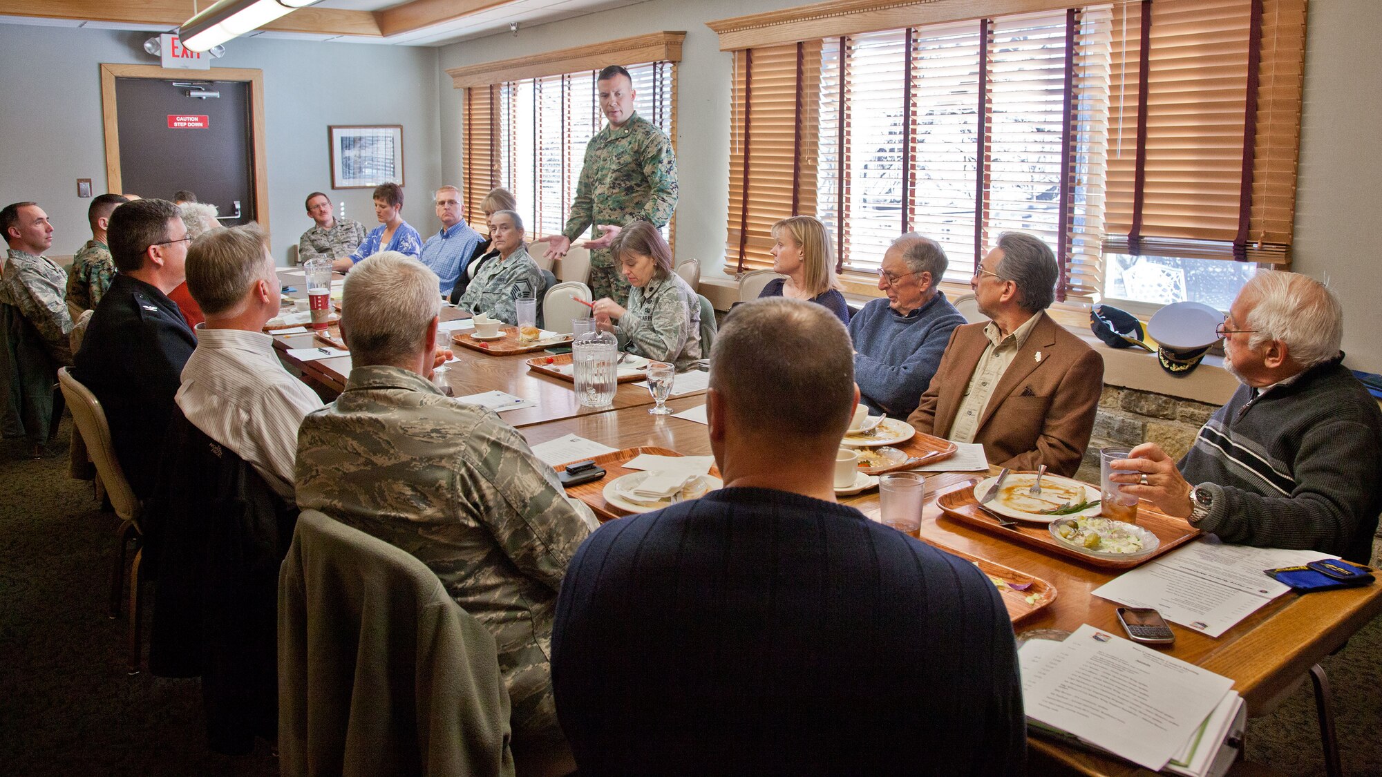 Maj. Richard Wilson, Marine Wing Support Squadron 471 site commander, speaks to the Base Community Council during its quarterly meeting, hosted at the 934th Airlift Wing Officer's Club.  The council meets to share information between Minneapolis-St. Paul Air Reserve Station leaders and members of the surrounding community. (U.S. Air Force Photo/Shannon McKay)