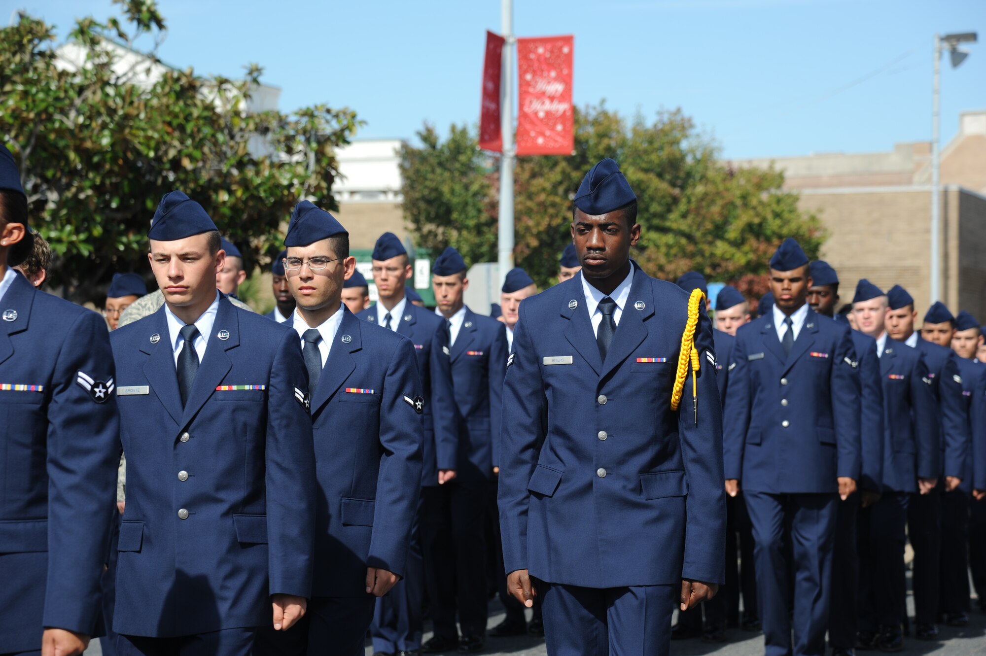Members of the 336th Training Squadron march in formation during the 13th Annual Gulf Coast Veterans Day Parade in front of City Hall Nov. 9, 2013, Biloxi, Miss. Keesler’s Wing leadership, Honor Guard, and Airmen, who carried the 50 State Flags, participated in the event. (U.S. Air Force photo by Kemberly Groue)