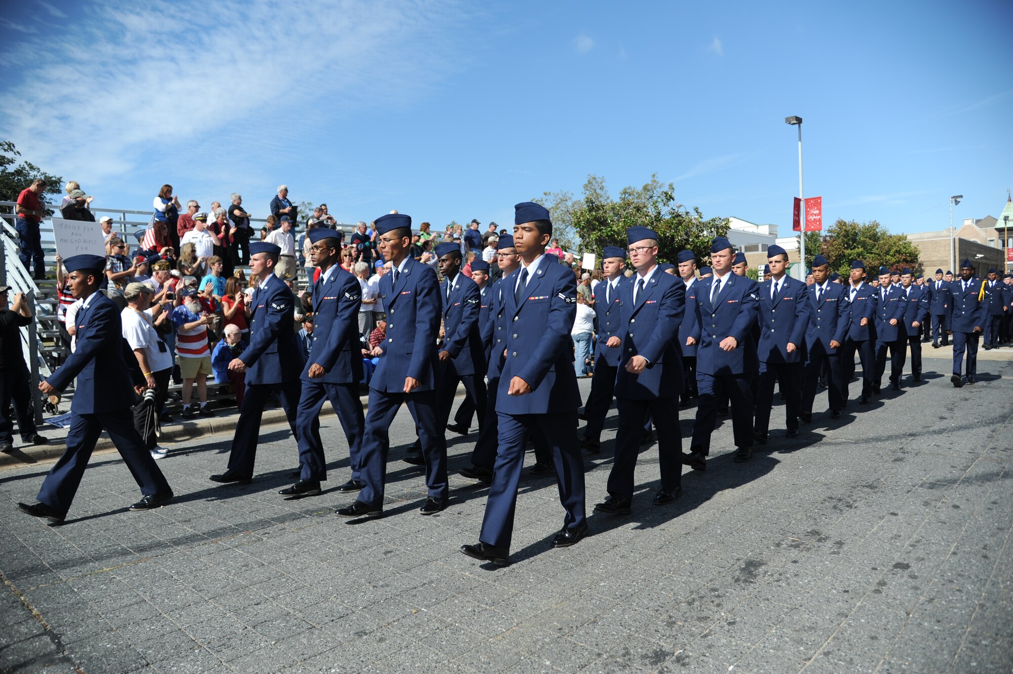 Members of the 336th Training Squadron march in front of City Hall during the 13th Annual Gulf Coast Veterans Day Parade in front of City Hall Nov. 9, 2013, Biloxi, Miss.  Keesler’s Wing leadership, Honor Guard, and Airmen, who carried the 50 State Flags, participated in the event. (U.S. Air Force photo by Kemberly Groue)