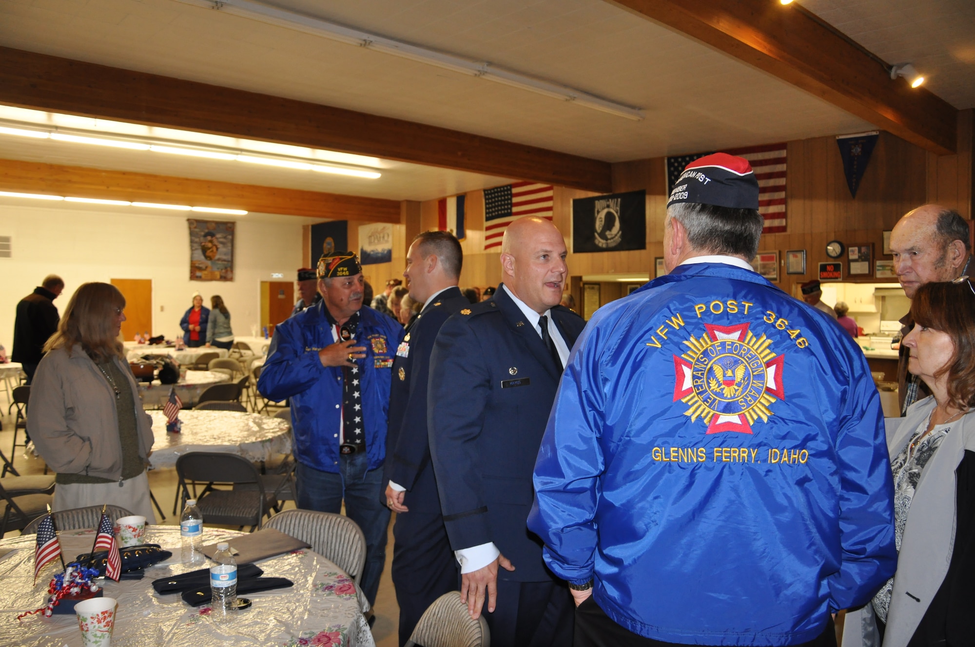 U.S. Air Force Maj. Brett Kayes, 366th Contracting Squadron commander, speaks with members of the Glenn's Ferry Veterans of Foreign Wars Post 3646 Nov. 11, 2013. On the 11th hour of the 11th day of the 11th month of 1918, an armistice, or temporary cessation of hostilities, was declared between the Allied nations and Germany during World War I. (U.S. Air Force photo by 2nd Lt. Rebecca Ennis/RELEASED) 