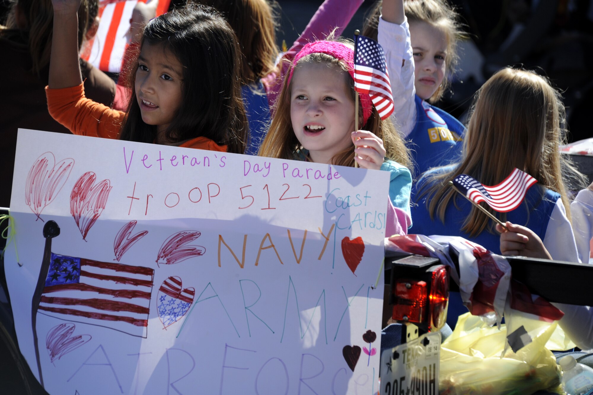 SAN ANGELO, Texas – Children from San Angelo cheer during the Veteran’s Day Parade Nov. 9 in historic downtown San Angelo. Team Goodfellow and the San Angelo community came together to march, walk, and cheer in celebration of America’s veterans. (U.S. Air Force photo/ Staff Sgt. Austin Knox)