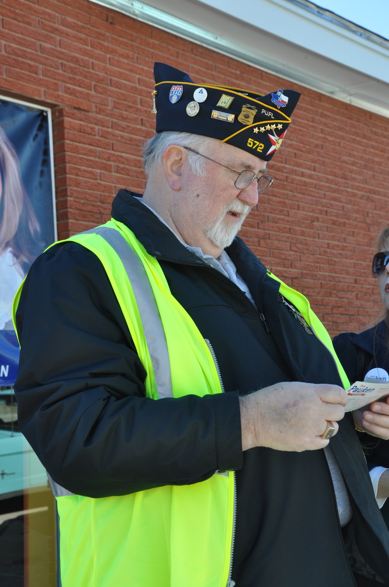 SAN ANGELO, Texas — Army Sgt. 1st Class Ronald Bell, retired, reads a flyer during the Veteran’s Day Parade Nov. 9 in historic downtown San Angelo. Bell said the community and Goodfellow have a great growing relationship. (U.S. Air Force photo/ Airman 1st Class Breonna Veal)