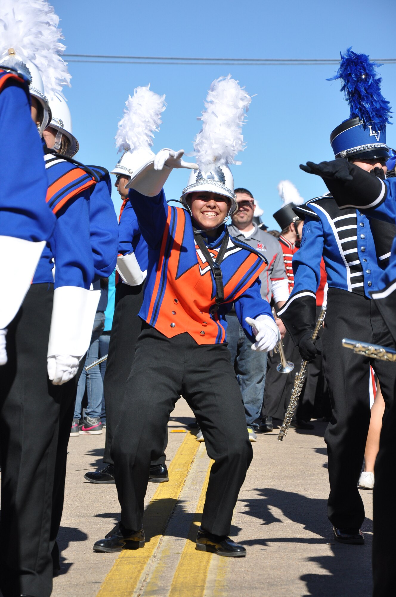 SAN ANGELO, Texas — A member from the Central High School marching band dances as the drum line plays before the Veteran’s Day Parade Nov. 9 in historic downtown San Angelo. Over 500 members from Goodfellow Air Force Base volunteered to march in the parade to show support. (U.S. Air Force photo/ Airman 1st Class Breonna Veal)