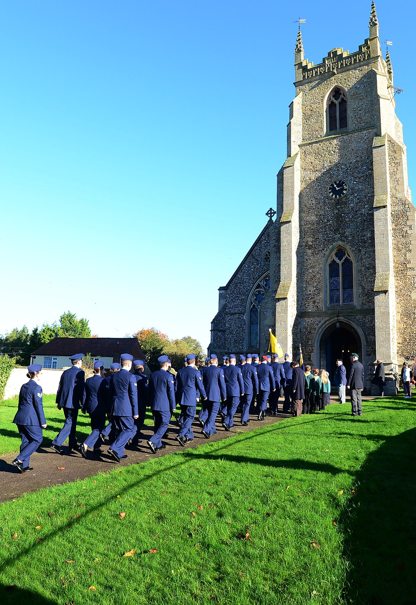 Liberty Airmen march into St. Mary’s Church following a Remembrance Day ceremony in Feltwell, England, Nov. 10, 2013. The commonwealth observes Remembrance Day to honor the memories of men and women of the armed forces that have lost their lives in wars, past and present. (U.S. Air Force photo by Senior Airman Tiffany M. Grigg/Released) 