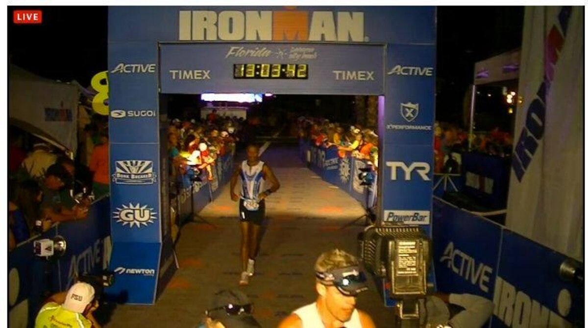 Col. Eric Cathey, director of dental programs and resources, Air ForceSurgeon General, crosses the finish line at the Ironman Triathlon in Panama City Beach, Fla., Nov. 2 with a time of 13 hours, 3 minutes and 45 seconds. This was the first full Ironman completed by the Air Force dentist, who has been competing for 16 years.  (Courtesy photo)