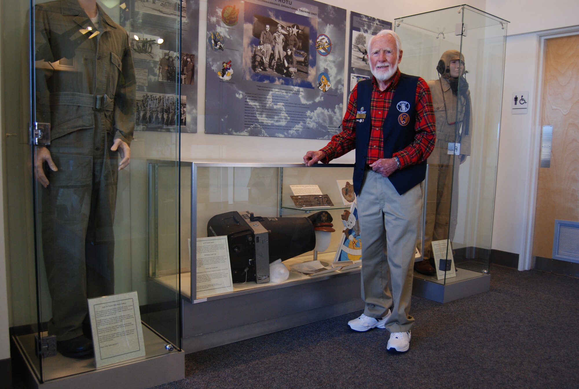 PETERSON AIR FORCE BASE, Colo. – Al Horne Jr. is a World War II veteran and volunteer at the Peterson Air and Space Museum. As a museum volunteer Horne shares stories including bartering for a barrel of frozen raspberries to mapping all of Greenland in a B-17 during his time in the Air Force. Horne is just one of the many veterans volunteering at the Peterson Air and Space Museum. With more than 20,000 retirees and thousands more veterans in the Colorado Springs community, Veterans Day at Peterson Air Force Base was a day to celebrate the thousands of veterans who have served and those who continue to serve. Veterans interested in volunteering at the Peterson Air and Space Museum should visit http://www.petemuseum.org. (U.S. Air Force photo/Michael Golembesky)