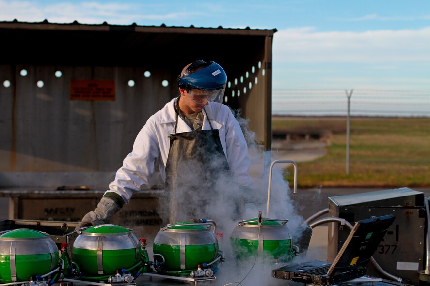 U.S. Air Force Airman 1st Class Christopher Garrison performs Liquid Oxygen (LOX) servicing at Atlantic City Air National Guard Base, N.J. on Nov. 6.  LOX is primarily used as aviator breathing oxygen.  Garrison is an F-16C Fighting Falcon crew chief assigned to the 177th Aircraft Maintenance Squadron, and his hometown is Millville, N.J..  (U.S. Air National Guard photo by Tech. Sgt. Matt Hecht/Released)