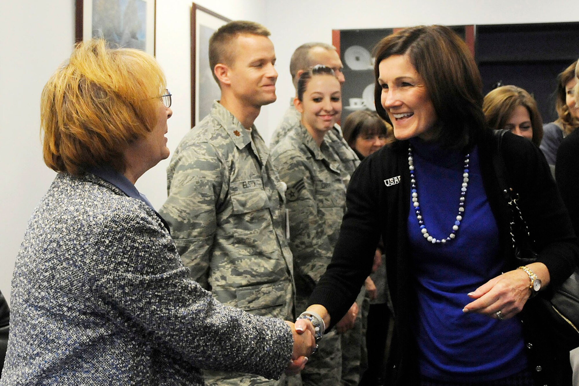 HANSCOM AIR FORCE BASE, Mass. – Betty Welsh is welcomed by Gail Murray, 66th Medical Squadron executive assistant, at the Hanscom Clinic as part of a base visit made with her husband, Air Force Chief of Staff Mark A. Welsh III, Nov. 7 and 8. During her visit, Welsh met with Hanscom Key Spouses, Airman and Family Readiness Center staff, school administrators and had lunch with spouses of senior leaders and deployed personnel. (U.S. Air Force photo by Linda LaBonte Britt)