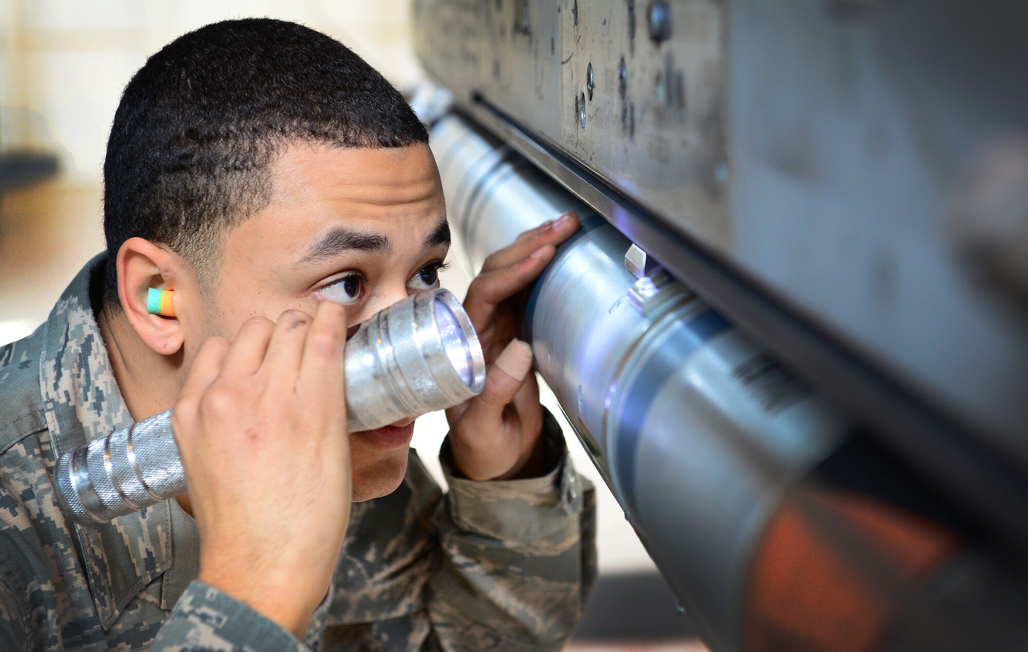 Staff Sgt. Angelo Cepeda, 31st Aircraft Maintenance Squadron weapons load crew team chief, inspects an ordnance attached to an F-16 Fighting Falcon, Nov. 6, 2013, at Aviano Air Base, Italy. Known as “flightline loaders,” these Airmen work hand-in-hand with the armament shop to help perform yearly function checks on Aviano’s F-16 equipment. (U.S Air Force photo/Senior Airman Matthew Lotz)