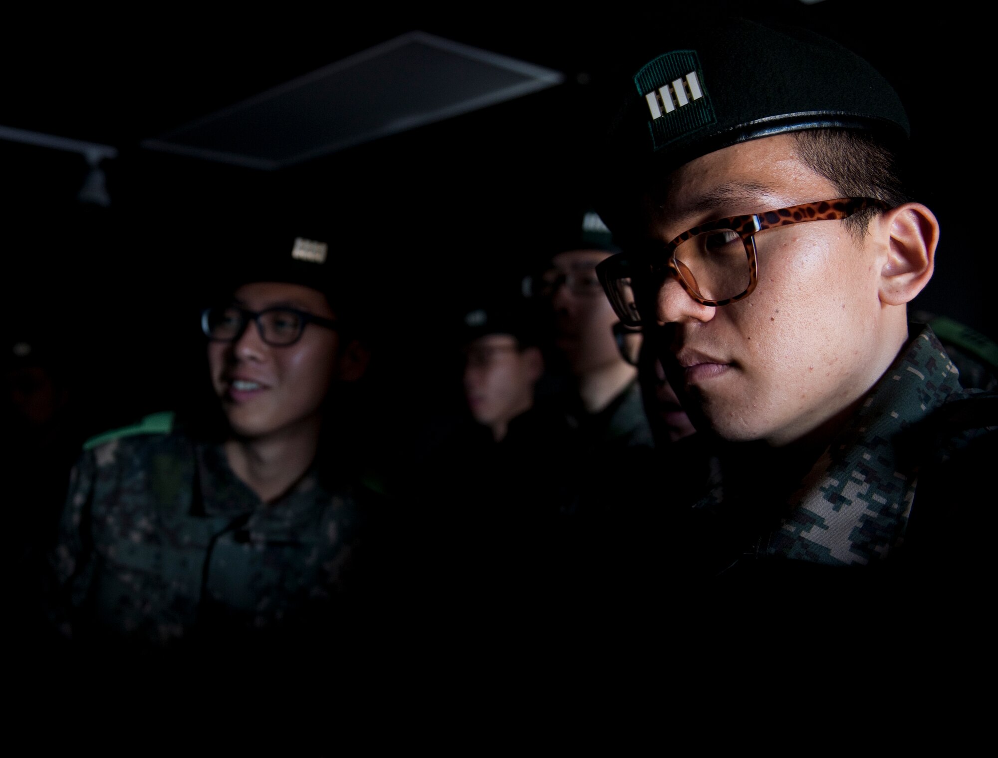 Republic of Korea cadets view the Kunsan air traffic control tower simulator at Kunsan Air Base, Republic of Korea, Nov. 13, 2013. Approximately 80 Republic of Korea cadets visited the Wolf Pack to view the joint mission with a tour of the air traffic control tower and mission brief. (U.S. Air Force photo by Senior Airman Armando A. Schwier-Morales/Released)