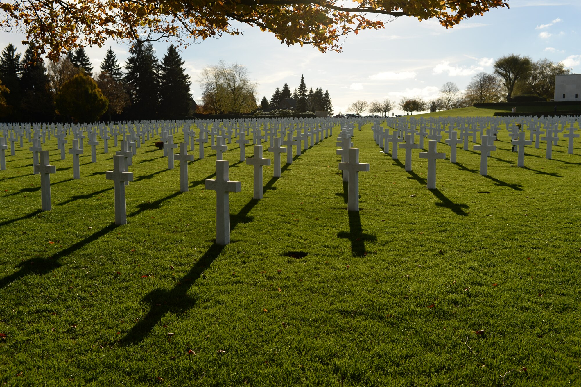 HOMBOURG, Belgium --- White marble crosses and stars marking the burial sites of American service members stand at the Henri-Chapelle American Cemetery Nov. 11, 2013. Nearly 8,000 U.S. Army Soldiers who died during World War II are buried at the site. (U.S. Air Force photo by Staff Sgt. Joe W. McFadden/Released)