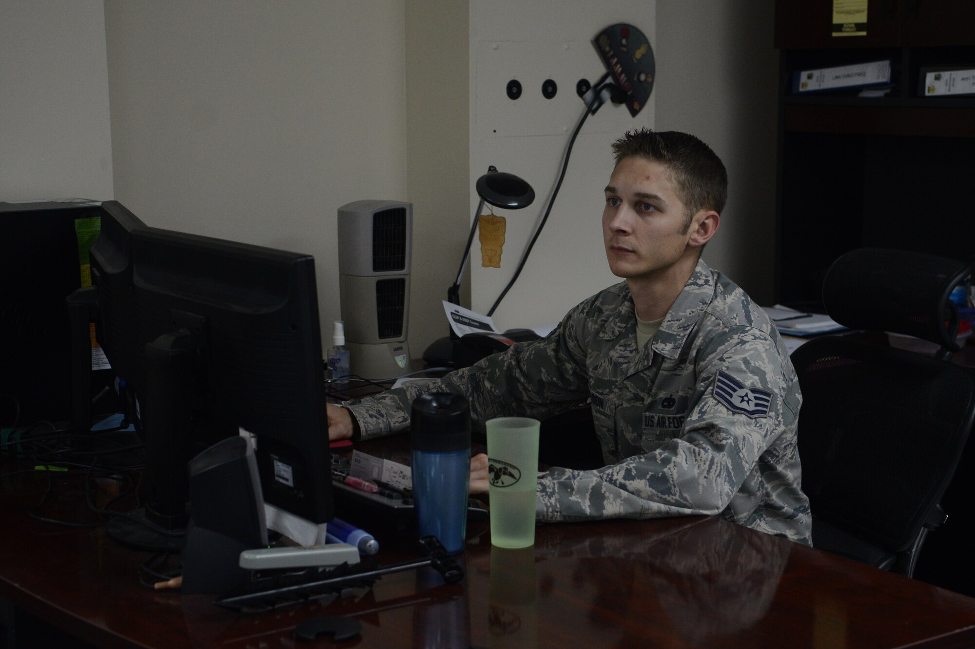 Staff Sgt. Samuel Wilson, 36th Maintenance Group security manager, works on the integrated maintenance database system Nov. 12, 2013, on Andersen Air Force Base, Guam. The inactivation of the flight is part of an Air Force-wide initiative to better align maintenance objectives for the future fiscal years. (U.S. Air Force photo by Airman 1st Class Emily A. Bradley/Released)