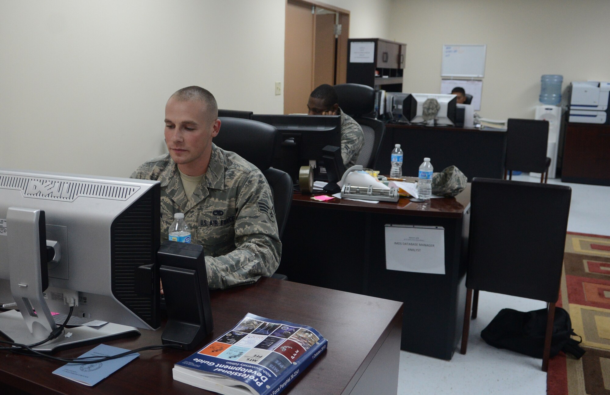 Senior Airman Benjamin Jordan, 36th Maintenance Group maintenance production manager, works on the integrated maintenance database system Nov. 12, 2013, on Andersen Air Force Base, Guam. The inactivation of the flight is part of an Air Force-wide initiative to better align maintenance objectives for the future fiscal years. (U.S. Air Force photo by Airman 1st Class Emily A. Bradley/Released)